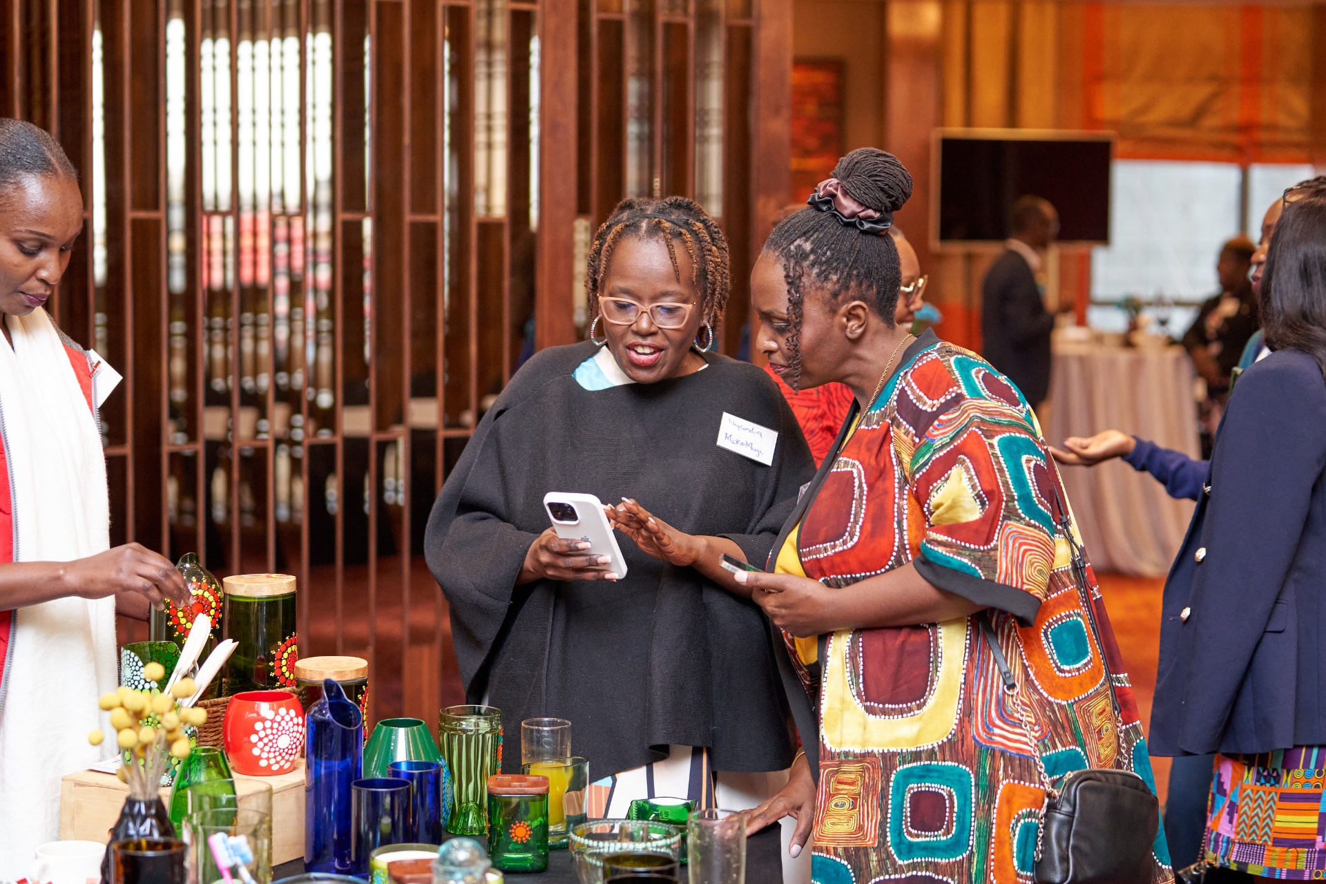 Women entrepreneurs discovering products together